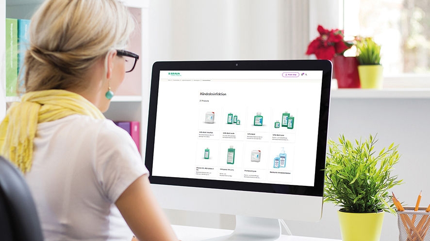 Woman creating her own website on computer